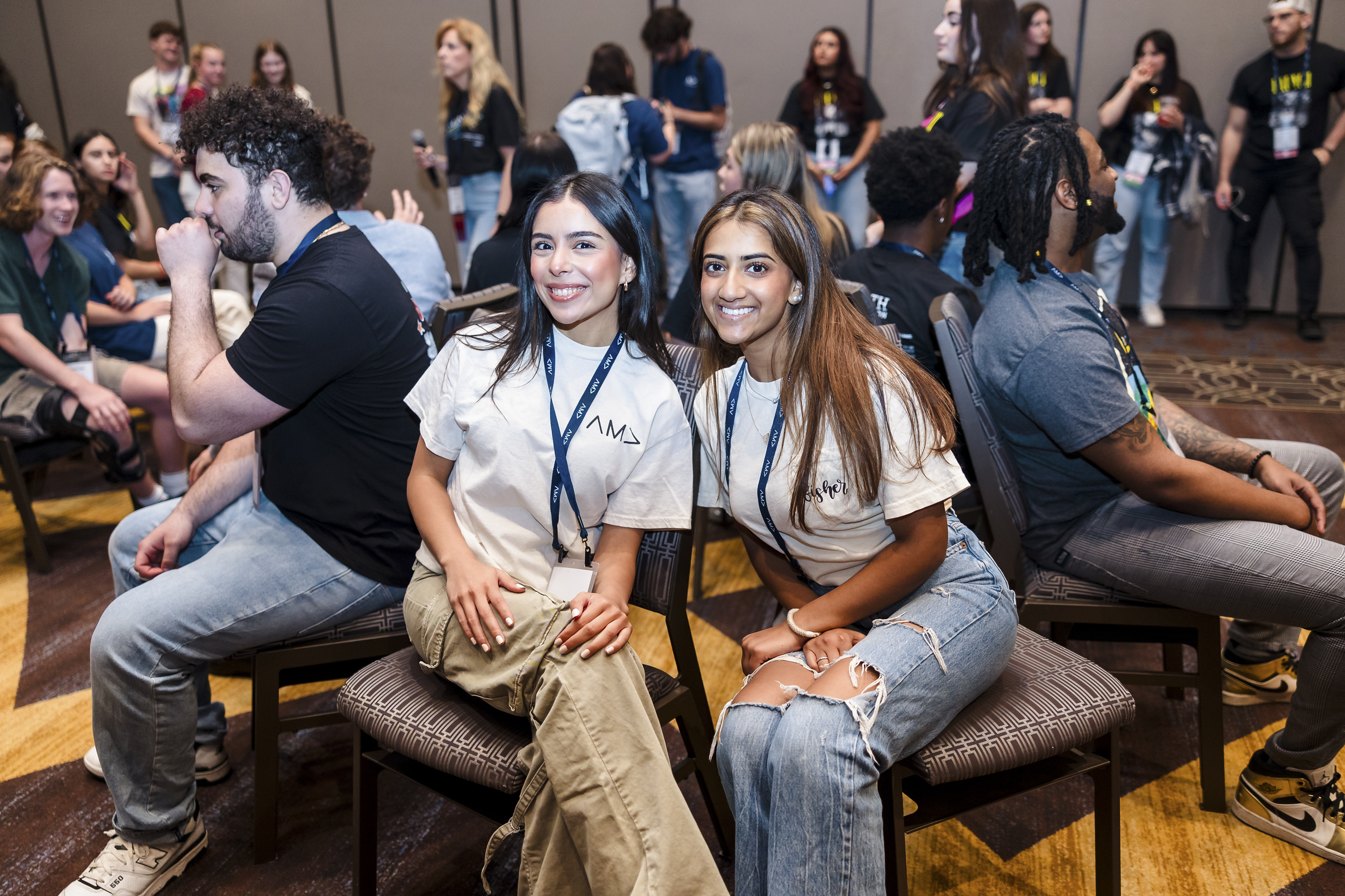 AMA students networking with peers at a conference